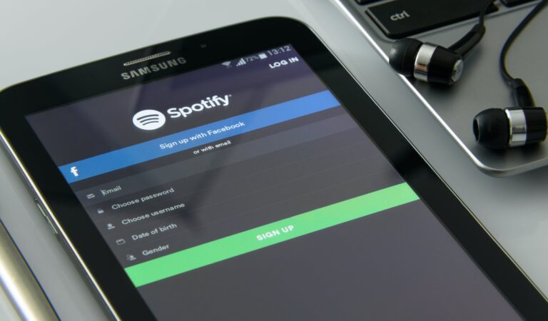 Spotify cuts royalties for non-music content