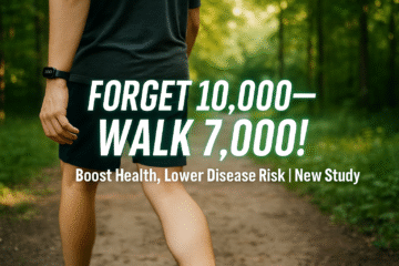 A person walking on a peaceful nature trail during sunrise, symbolizing the health benefits of daily steps and an active lifestyle.
